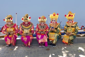 Legong dancers waiting for their performance, (background changed), Sanur, Bali, Indonesia