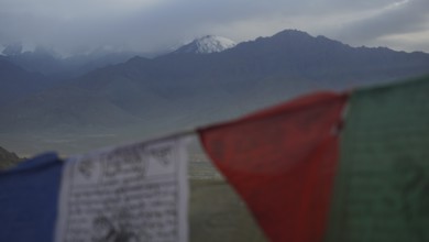 Prayer flags against a dramatic mountain backdrop, Leh, Ladakh, North India, Himalayas, India