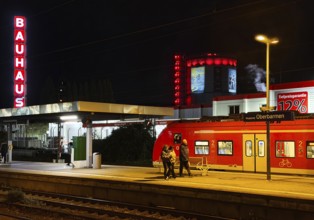 Local train at Oberbamen station with gas boiler at night, Wuppertal, North-Rhine Westphalia,