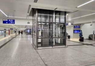 Bright pedestrian tunnel to the platforms after renovation work, central railway station, Dortmund,