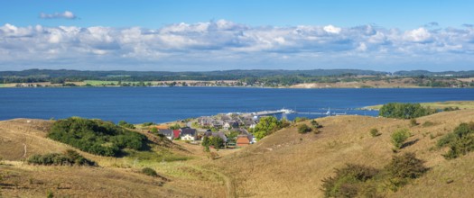 Hilly landscape in the Zicker Mountains, including Zicker Alps, view over the lagoon landscape to