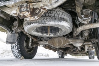 View from underneath a Toyota Tacoma car in winter. Region of La Mauricie, Province of Quebec,