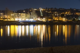 Atmospheric night view on the Elbe at the Blue Wonder with Loschwitz district and suspension