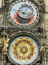 Prague City Hall, detailed astronomical with figures and colorful dial on a historic building,