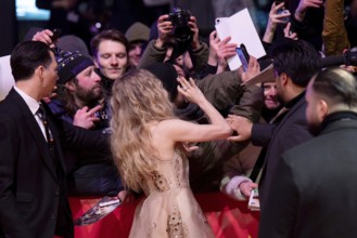 Amanda Seyfried with fans on the Red Carpet at the premiere of the film The Testament Of Ann Lee at
