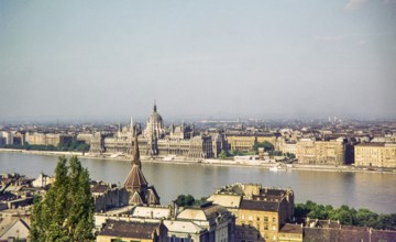 Cityscape view across Danube River from Buda to Pest, Hungarian Parliament Building, Budapest,