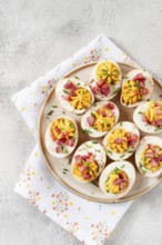 Spicy, stuffed ramen eggs, with bacon and green onions, homemade, no people