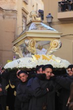 Sicily, old town of Trapani, Good Friday mystery procession La Processione dei Misteri, men,