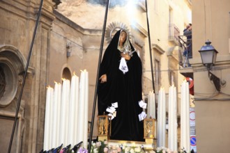 Sicily, old town of Trapani, Good Friday mystery procession La Processione dei Misteri, men,