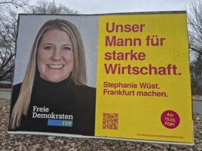 An election poster of the top FDP candidate Stephanie Wüst in Frankfurt am Main advertises with the