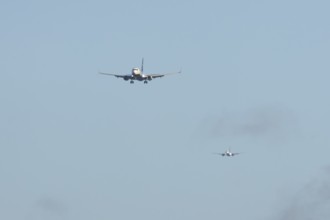Boeing 737 two commercial passenger airliner jet aircraft of Ryanair airways in flight on approach
