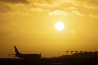 Boeing 737 commercial passenger airliner jet aircraft of Ryanair airlines moving onto the runway to