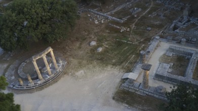 Philippeion, part of the Temple of Hera, aerial view of ancient ruins with columns and trees, drone