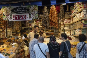 Istanbul, Turkey. September 18th 2025. A busy street market stall selling nuts, Turkish Delight and
