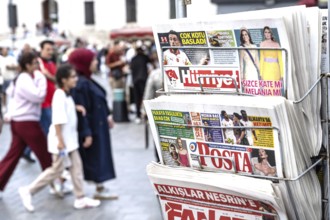 Istanbul, Turkey. September 18th 2025. Popular Turkish newspapers for sale outside a shop in a busy