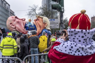 Rose Monday procession in Düsseldorf, theme car of wagon maker Jacques Tilly, Putin and Trump eat