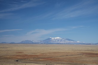 Winslow, Arizona - The San Francisco Peaks, seen from the Meteor Crater, about 45 miles distant.