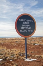 Winslow, Arizona - A speed limit sign on the road to Meteor Crater. The crater was formed about 50,