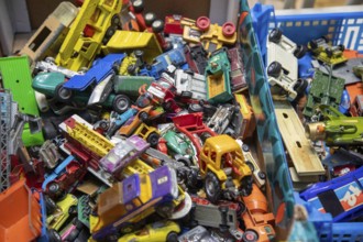 Jumble of vintage die-cast toy cars, including classic Matchbox and Corgi models, UK