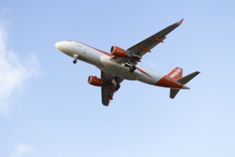 Airbus A320 commercial passenger airliner jet aircraft of Easyjet airlines flying on approach to