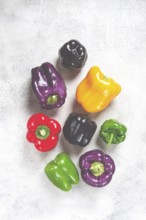 Assortment, of colorful bell peppers, on a light background, top view, no people