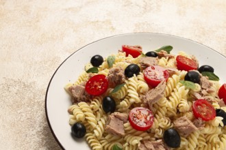Tuna salad, fusilli pasta, olives and cherry, olive oil, homemade
