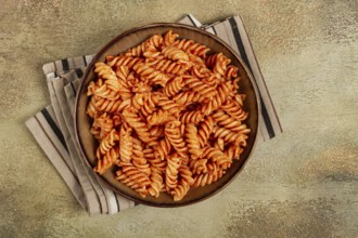 Fusilli pasta dish, made with tomato sauce, homemade, no people