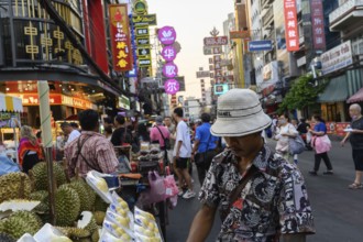 Bangkok, Thailand. February 18th 2025. Popular street food stalls along a crowded Yaowarat Road,