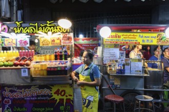 Bangkok, Thailand. February 18th 2025. Street food stalls selling fresh juice and fish maw soup in