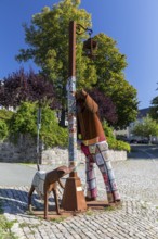 Iron Giants sculpture Territorios or drunk with dog by Edgardo Camona on the old market in