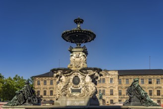 The Paulibrunnen on the market square and the castle in Erlangen, Middle Franconia, Bavaria,