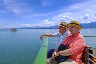 Seniors on a boat trip on the Chiemsee, Chiemgau, Upper Bavaria, Bavaria, Germany