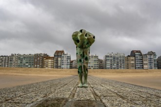 Art on the North Sea beach, in Knokke-Heist, Tomorrow Man by Cathérine François, is washed over by
