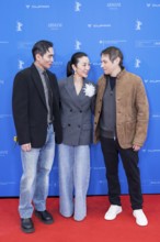 Hang Chong, Michelle Yeoh and Sean Baker in front of the premiere of the film Everything Everywhere