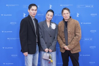 Hang Chong, Michelle Yeoh and Sean Baker in front of the premiere of the film Everything Everywhere