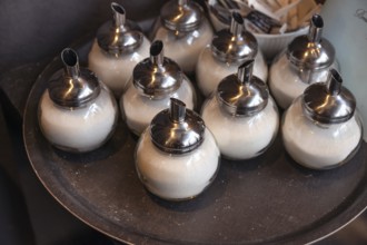 Sugar bowls on a tray in a café, Nürfnbertg, Middle Franconia, Bavaria, Germany