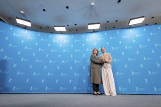 Tricia Tuttle (Artistic Director of the Berlinale) and Michelle Yeoh with the Golden Bear at the