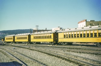 Passenger railway carriages of the Denver and Rio Grande Western Narrow Gauge Railroad, at depot