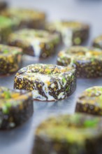 Close-up of a chocolate with a lively, colorful design, vegan chocolates production, Haselstaller