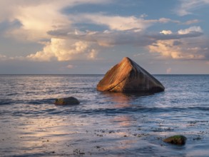 Sunset on the Baltic Sea, boulders on the shore, the Swanenstein in the last light, Lohme, Jasmund