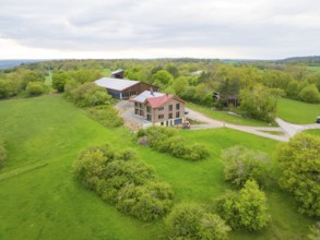 Farm in green surroundings with views of fields and forests, timber house construction, Gechingen,