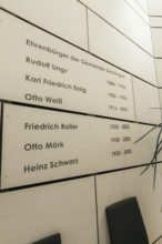 Panel with honorary citizens' names in a minimalistic interior, Gechingen Town Hall, Calw district,