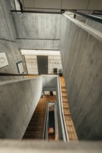 Modern architecture with concrete and wooden tiles from a stairway view, Gechingen Town Hall, Calw