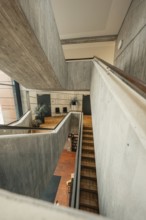 Staircase in a modern building with concrete architecture and large windows, Gechingen Town Hall,