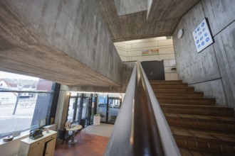 Architecture with modern concrete staircase, minimalistic design and lighting, Gechingen Town Hall,