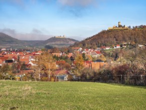 View of the village of Mühlberg and the ruins of Mühlburg and Gleichen Castle in autumn, castle