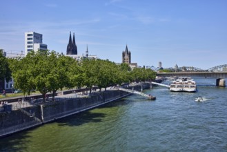 Rhine river, high-rise building, chamber of crafts, church towers of Cologne Cathedral and Groß St.