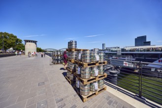Pallets with beer barrels, boat launch, gangway, Rhine river, waterfront, level, metal railings,