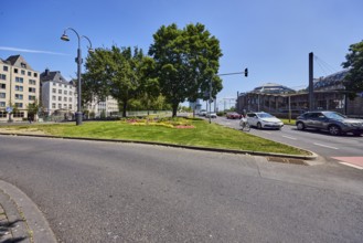 Traffic island, roads, general architecture, lantern, cycle path, cars, bicycle, cyclists, lawn,