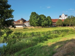 View across the Helme River to Heringen Castle, Thuringia, Germany